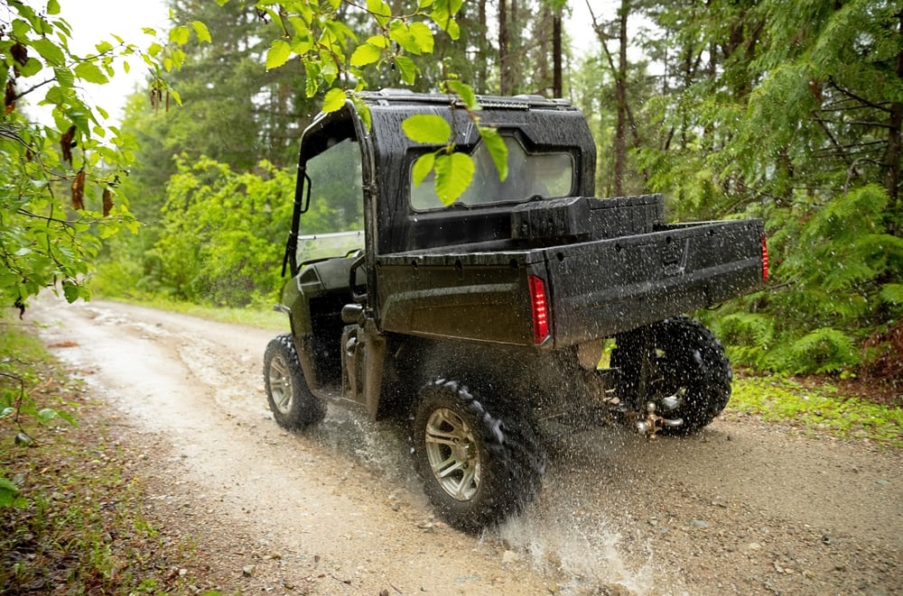 UTV driving down a gravel path in Wisconsin