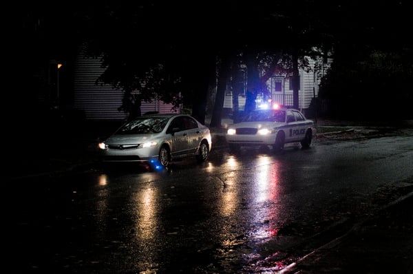 police car pulling over another car