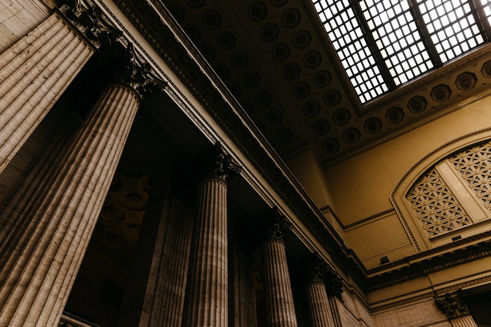 pillars supporting balcony inside courthouse